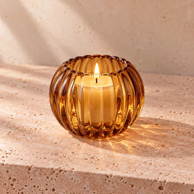 Amber glass candle votive